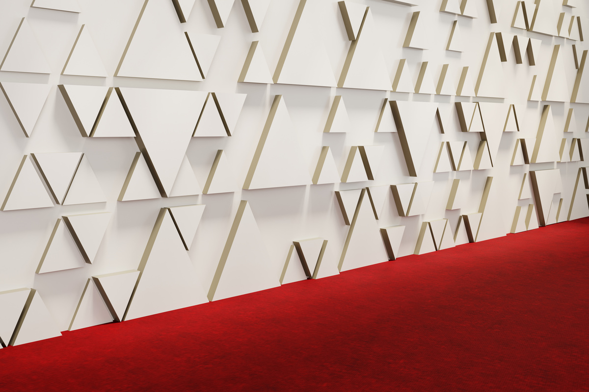 Red Carpet and White Triangle Shaped Wall